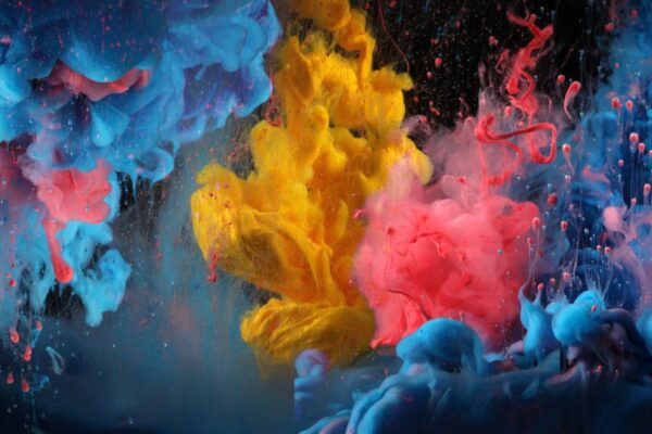 Several "explosions" of colors burst underwater in the following sequence: red, blue, yellow, red, and blue.